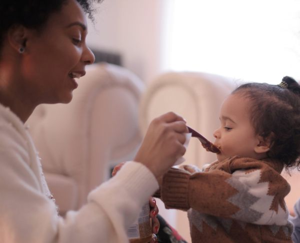 mother feeding baby