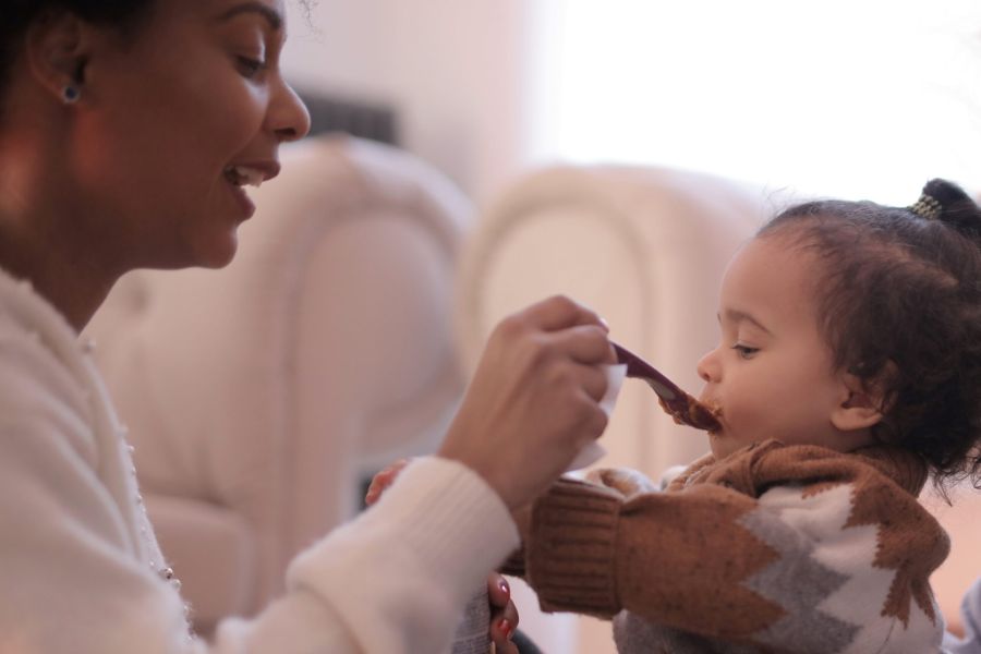 mother feeding baby