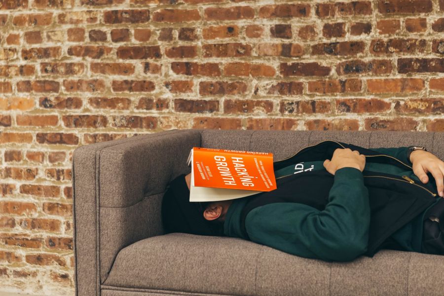 man laying on couch