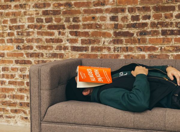 man laying on couch