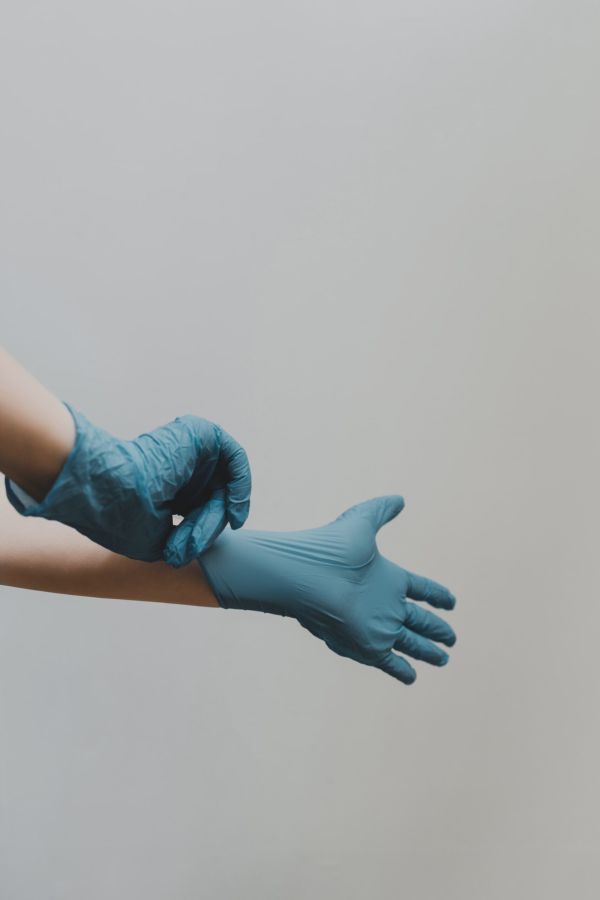 No hand shaking hand with gloves